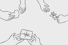 four hands reaching for a small gift box