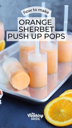 orange sherbet push up pops on a tray