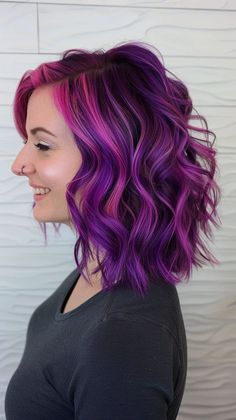 25 Prettiest Purple Hair Color Ideas To Make Your Hair Pop Purple Hair Colors Ideas, Dark Purple With Light Purple Highlights, Hidden Purple Highlights, Bright Hair Colors Short Shoulder Length, Fall Vivid Hair Color For Brunettes, Purple Hair With Black Highlights, Purple Hair Color Ideas For Brunettes, Purple To Pink Ombre Hair, Pink Purple Hair Color