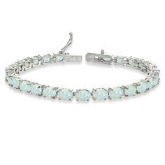 PRICES MAY VARY. Feature - Express your style and elegance with this classic tennis bracelet. This stunning bracelet features dazzling 6x4mm oval-cut gemstones, for a chic and trendy look Crafted - The bracelet is crafted of fine sterling silver. It measures 7.25 inches and secures with a box and tongue with a safety latch Care - Keep from water cosmetics & chemical product. Clean with microfiber cloth Packaging - Jewelry packaged with a nice box ready for gifting About – Our jewelry collection Oval Opal Bracelets As Gift, Oval Opal Bracelets For Gifts, White Sterling Silver Tennis Bracelet As Gift, White Tennis Bracelet Bangle As Gift, White Tennis Bangle Bracelet As Gift, White Tennis Bangle Bracelet For Gift, Adjustable White Tennis Bracelet As Gift, White Gold Oval Tennis Bracelet Gift, Adjustable Oval Fine Jewelry Bracelet