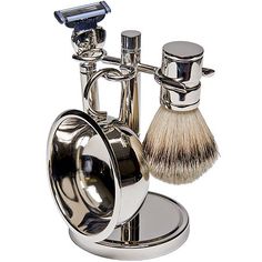 For the well-groomed gentleman, this handsome, silver-plated set lets you shave in style.All you need for the perfect shaveNatural bristle brush creates great latherOrganize all the items on the stand for easy accessIncludes: Natural bristle shave brush, Razor with Mach III blade, Removable bowl with shave soap, StandMeasurements: 5.25 Length/Inches, 6.5 Height/Inches, 4 Width/InchesBase Material: 100% MetalCare: Rinse CleanCountry of Origin: Imported Shaving Kit, Health Hacks, Shaving Set, Moustaches, Wet Shaving, Mens Shaving, Shaving Brush, Grooming Kit, Cool Stuff