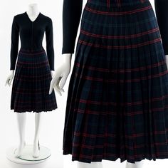 - 50s tartan woolen pleated skirt - metal zipper closure - reversible (same pattern on other side) - warm and thick - knee length - high waisted Fits like:  XS - S Material:  Wool Condition:  Great Clipped on Mannequin:  No ✂ SIZE + FIT ✂ Length: 26" / 66 cm Waist: 26" / 66 cm Hips: 34" / 86 cm All measurements are taken with garment lying flat. ALWAYS refer to measurements as vintage sizes can vary greatly from today's modern sizes. We recommend comparing measurements above with a similar style garment you own for best fit before purchasing.  DRESS FORM / MANNEQUIN is wearing the size detailed above but she typically measures a size 4/6 by modern retail sizes or a general size small. Belt Accessories and other clothes are NOT included. ▲▲All Garments Have Been Laundered/Steamed or Dry Cle Tartan Skirt, Dress Form Mannequin, Red Tartan, Wool Skirts, Dress Form, Pleated Skirt, Knee Length, Tartan, Womens Skirt