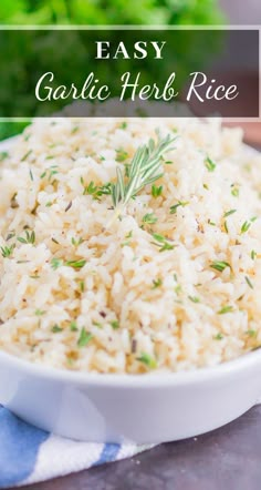 garlic herb rice in a white bowl on a blue and white towel with text overlay that reads easy garlic herb rice