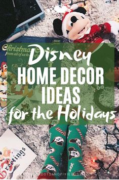 there is a stuffed mickey mouse on the bed with christmas decorations around it and text overlay that reads disney home decor ideas for the holidays