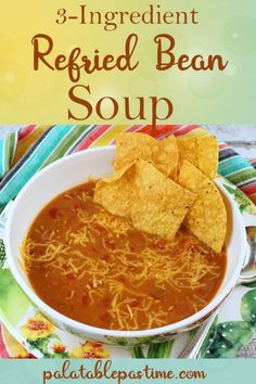 a bowl of soup with tortilla chips on the side and text overlay reads 3 ingredient refried bean soup