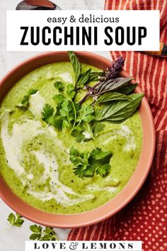 a bowl filled with green soup and garnished with cilantro