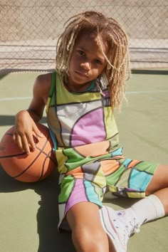 Get ready to slam dunk in these playful Molo Multi Color Kids cotton shorts! Featuring a whimsical, multi-colored, modern basketball court print, these knee-length shorts have a regular fit and an adjustable elastic waist. Side seam pockets and a single back pocket. Game on! Check out the rest of our Molo Collection Features: 100% Organic cotton Elastic waist with drawstring Longer length short Side pockets, single back pocket Wash cold/ Hang dry | No bleach, softeners, dry clean Molo products a Modern Basketball Court, Diaper Bag Accessories, Pocket Game, Knee Length Shorts, Kids Trend, Clothing Design, Slam Dunk, Baby Socks, Game On