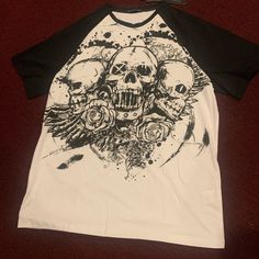 Men’s Skull Tshirt Black And White . Skulls And Roses, Skull Tshirt, Tshirt Colors, Black Tshirt, Tee Shirts, Roses, Mens Shirts, Black White, Man Shop