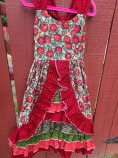 Delicious apples on a beautiful autumn day.  The sun dress has two apple appliques on the upper left bodice.  Ruffle and ties in a rust with gold mini polkadots material that go over the shoulders and form a beautiful bow in the back.  This is a girl's size 6.   Machine sewn of 100% cotton.  The sundress can be paired with a contrast top or blouse (not included) and worn as a jumper.  Inspired by my granddaughter. Sizing:        fits chest 24 inches, length from middle of bodice to lower hem is Apple Clothes, Autumn Apples, Apple Dress, Contrast Top, Fall Apples, Dress Autumn, Beautiful Autumn, Fall Clothes, Sun Dress