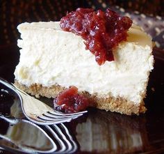 a piece of cheesecake on a plate with a fork