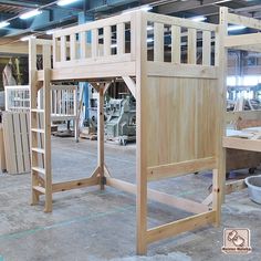 the wooden structure is being built in the shop for people to work on their crafts