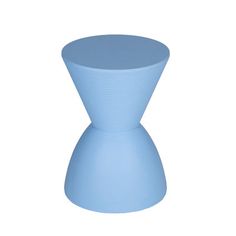 a light blue stool sitting on top of a white floor