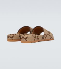 Maxi GG canvas slides in beige - Gucci | Mytheresa Tom Ford Clothing, Gucci Eyewear, Leather Logo, Derby Shoes, Gucci Shoes, Ski Wear, Formal Shoes, Manolo Blahnik, Mini Bag