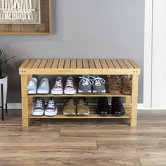 a wooden shoe rack with shoes on it