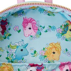 **Now Shipping** This whimsical accessory portrays the Show Stable where you’ll find Applejack, Blue Bell, and Cotton Candy waiting to play behind functional stable doors! On the left-side pocket gallops Medley, and Butterscotch prances on the right-side pocket. Starshine and Blossom appear above the stable, gliding on a rainbow surrounded by stars and butterflies. On the back of the bag, Minty, Cotton Candy, and Blue Bell play in the rolling pasture. This backpack is an officially licensed My L Pony Stable, My Little Pony Backpack, Stable Doors, Whimsical Accessories, Creepy Images, Blue Bell, 80s Retro, 40th Anniversary, Mini Backpack