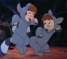 two cartoon characters dressed in animal onesuits, one is pointing at the other