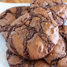 a pile of chocolate cookies sitting on top of each other