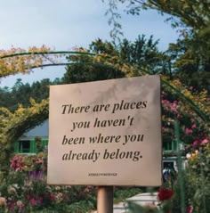 a sign that says there are places you haven't been where you already belong