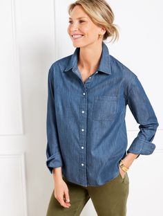 Our forever classic shirt updated in a short, boxy silhouette for day-to-night ease. Made from vertically striated denim with a chest pocket. A closet must-have. Features Long Sleeve Hits Above Hip Shirt Collar Button front closure Chest pocket Curved hem Imported Fit: Misses: 25"; Petite: 24"; Plus: 28 1/2"; Plus Petite: 27" Material: 100% Cotton Care: Turn Garment Inside Out, Machine Wash Cold With Like Colors, Gentle Cycle, Only Non-Chlorine Bleach When Needed; Tumble Dry Low, Warm Iron If Ne Must Have Wardrobe Essentials, Minimalist Wardrobe Essentials, Capsule Wardrobe Women, Short Shirt, Classic Style Women, Minimalist Wardrobe, Casual Work Outfits, Denim Short, Short Shirts