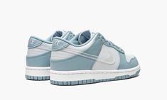 The Nike Dunk Low GS “Clear Swoosh/Blue” is the youth sizing of the vintage basketball shoe in a versatile colorway that can be worn in any season.  This casual look for the Nike Dunk shoe features a white leather base with contrasting light blue leather panels on the forefoot, eyelets, collar, and heel.  A translucent Swoosh is found on both sides of the shoe.  Additional branding efforts include white “Nike” embroidery on the heel and light blue “Nike” and Swoosh detailing on the tongue tag. Back To School Shoes, Trendy Shoes Sneakers, Nike Shoes Girls, Pretty Shoes Sneakers, All Nike Shoes, Baskets Nike, Cute Nike Shoes, Cute Sneakers, Hype Shoes