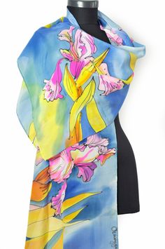 Luxury Silk Scarf. Orchids in blue, rose and yellow. Hand painted silk shawl.  Luxury silk shawl. Painting flowers.  This silk scarf is painted on fine 100% pure silk , and is hand hemmed. Luxury silk gift for woman. Beautiful shawl for summer,autumn and winter!  Luxury gift for every solution.  dimensions -20 by 78 inches=50 by 200 cm -------------------------------------------------------------------------- This hand painted silk scarf I created is the only one on this planet. I never use guid Blue Silk Scarves For Spring, Artistic Multicolor Silk Scarf With Floral Print, Artistic Multicolor Floral Print Silk Scarf, Multicolor Silk Floral Print Shawl, Multicolor Silk Shawl Scarf, Multicolor Silk Shawl With Floral Print, Multicolor Silk Shawl, Artistic Multicolor Silk Shawl, Artistic Blue Silk Scarf For Spring