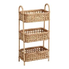 three wicker baskets stacked on top of each other in front of a white background