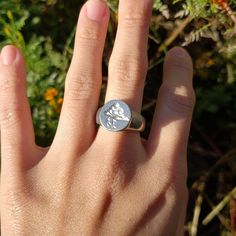 This signet ring is cast in lead-free pewter. The ring size when cast is 7. The sealing image is a storm cloud. This is part of a series of signet rings I am making cast from lead-free pewter. Each ring master is hand sculpted to give a unique, rustic style, relief image when used as a seal, with sealing wax. Wax Seal Ring, Ring Master, Face Wax, Pewter Ring, Resize Ring, Signet Rings, 3 Stone Rings, Sealing Wax, Seal Stamp