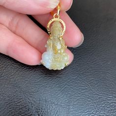 Description: 14k Solid Real Gold Natural Jade Kwan Yin Lady Buddha Natural Jade Pendant (Chain Is Not Included) Item No.: P4.15 Metal Type: 14k Solid Gold, Not Filled Or Plated (Stamped "14k" ) Metal Color: Yellow Gold Measurement: Stones: Natural Jade With Bale: 33 X 16 Mm Without Jade: 23 X 16 Mm Thickness: 6 Mm Est. Total Weight: 4.15 Grams Note: *Chain Is Not Included. Available For Sale In Another Listing. Lady Buddha, Phoenix Necklace, Shine Jewelry, Buddha Jewelry, Buddha Necklace, Real Gold Jewelry, Kwan Yin, Dog Pendant, Round Pendant Necklace