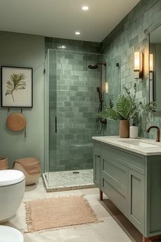 15 New Bathroom Design Trends For 2024 And 2025 Seafoam Green Interior Design, Master Bath Green Tile, Green Bathroom Tiles Ideas, Sage Green Modern Bathroom, Granite Tile Bathroom, Sage Vanity Bathroom Ideas, Bathroom Remodel Sage Green, Bathroom Remodel Green Tile, Sage Green And Brown Bathroom