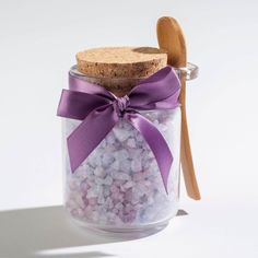 Our chunky solar sea salt crystals are generously infused with the highest quality of lavender essential oil to provide a truly calming bath experience. The salts help to remove dead skin cells from the skin's surface leaving skin looking revived.  The salts come in a cute 4" tall honey jar with a thick cork lid and a wooden spoon.  Wrapped with a lavender ribbon and bow, for a fun gift.  8oz BA0053 Lavender Ribbon, Spa Masks, Lavender Bath Salts, Spa Items, Salt Crystals, Lavender Gifts, Lavender Bath, Salt Crystal, Cork Lid