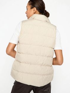 Everyone needs a chic little puffer vest, and our Anders Vest is our modern take on this forever classic. It includes those special Brochu Walker touches like a high stand collar and grosgrain detailing on the hidden snap closure. Lightweight and down-filled, it features side seam pockets for added functionality and a slightly curved back hem that makes it always feminine and the perfect layer. Runs true to size Tailored fit High stand collar Snap hidden front closure with grosgrain detail Side Brochu Walker, Beauty Gift Card, Mens Vests, Curved Back, Down Vest, Women Men Shoes, Puffer Vest, Denim Pants, Stand Collar