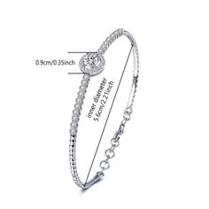 Experience luxury with our 925 Sterling Silver 0.5 Carat Moissanite Round Bracelet. The high-end, simple design exudes a sense of sophistication and elegance. Perfect as a thoughtful souvenir for mothers or to elevate your jewelry collection. Indulge in the brilliance of Moissanite, the diamond alternative. SPECIFICATIONS Brand Name: KAHOOT Origin: Mainland China Certificate: YES Metals Type: Silver Metal Stamp: 925, Sterling Gender: Women Main Stone: Moissanite Item Weight: 5.87g Bracelets Type Sterling Silver Cubic Zirconia Bracelet For Anniversary, White Gold Moissanite Jubilee Bracelet, Moissanite Bangle Bracelet As Gift, Moissanite Diamond Bangle Bracelet As Gift, Silver Moissanite Bracelets For Wedding, Anniversary White Gold Chain Bracelet With Cubic Zirconia, White Gold Cubic Zirconia Chain Bracelet For Anniversary, Jubilee Moissanite Bracelets, Jubilee Bracelet In Moissanite