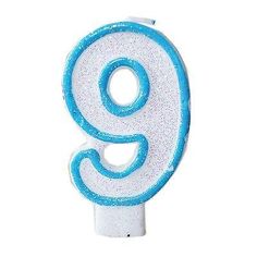 a white and blue number nine candle with glitter on it