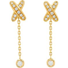 In a world where elegance meets modern artistry, these exquisite 18K yellow gold Chaumet diamond earrings capture the essence of luxury and sophistication. These earrings, crafted from the finest 18K yellow gold, are a testament to timeless beauty, offering a radiant glow that enhances the allure of any outfit. The intricate design features a captivating "X" motif, adorned with brilliant diamonds totaling 0.40 carats, delicately set to sparkle with every movement. Each diamond, carefully selecte Earrings With Chain, Diamond Birthstone, Delicate Chain, Brilliant Diamond, Chain Earrings, Intricate Design, Classic Elegance, In A World, Estate Jewelry