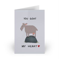 a card with an image of a goat on top of a rock and the words, you