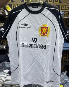 a soccer jersey is on display in a store