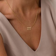 Embrace the significance of your angel number with our stunning Angel Number Necklace. Available in customizable options such as 111,222,333,444,555,666,777,888,999 this necklace serves as a meaningful reminder of divine guidance and personal growth. Material Options: 925 Sterling Silver 18K Gold Plated 18k Rose Gold Plated  If you choose one of the "Gold Plated" options, your necklace will be plated with gold on 925 Sterling Silver. Chain Length Options: 14 inches  16 inches  18 inches  20 inches  22 inches  24 inches  26 inches  How to Order: Choose the Material and Finish. Select the Necklace Length. Add your angel number in the personalization box. Add to Cart. Complete Order. Turnaround Time: If the issue is caused by us, we offer a free replacement guarantee (valid for 14 days from t Number Necklace, Name Necklace, Chain Lengths, Rose Gold Plates, Or Rose, Favorite Jewelry, Necklace Lengths, Gold Necklace, Angel