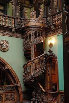 an ornate staircase in the middle of a building