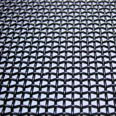 an image of a metal surface that looks like it is made out of wire mesh