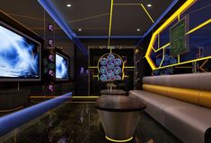 a room with couches, tables and televisions in the center is lit up by neon lights