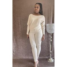 The Off-Shoulder Style And Hint Of Metallic Gold Knit Will Have You Looking Effortlessly Glam Yet Laid Back In A Matter Of Minutes. - New With Tag - Cream Color - Two-Piece Set With Subtle Metallic Gold Knit - Long Sleeve Off-Shoulder Sweater - Leggings - Size S/M Worn In Photo - Material: 51% Polyester, 36% Viscose, 13% Nylon Beige Knit Loungewear Sets, Chic Winter Jumpsuits And Rompers For Loungewear, Fitted Loungewear Jumpsuits And Rompers Matching Set, Chic Cream Jumpsuits And Rompers For Loungewear, Fitted Cream Jumpsuits And Rompers For Loungewear, Free People Leggings, Sweater Leggings, Alo Yoga Leggings, Hem Leggings