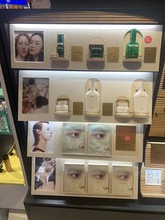 a display case with many different types of facial care products on it's sides