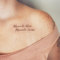 a woman with a tattoo on her shoulder that reads, mamacit mera manantao verde