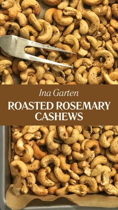 roasted rosemary cashews in a pan with a pair of tongs on top