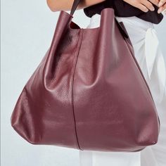 Buttery Soft, Slouchy Leather Shoulder Bag. Flat Metal Stud Detail On Handle 100% Genuine Leather Dimensions: 21.5" X 17", Chic Burgundy Pouch Bag, Chic Burgundy Clutch Bag, Everyday Large Capacity Burgundy Hobo Bag, Red Leather-lined Shoulder Bag For Office, Chic Burgundy Soft Leather Shoulder Bag, Chic Burgundy Leather Satchel, Versatile Red Hobo Bag With Large Capacity, Versatile Large Capacity Red Hobo Bag, Burgundy Soft Leather Satchel For Shopping