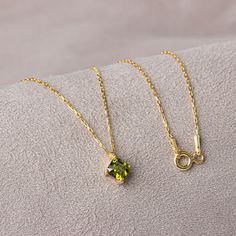 "Peridot stone is a stone that provides body-mind balance. Positive thinking gives a feeling of optimism. Peridot, the birthstone for those born in August Our square peridot necklace is designed to create new styles. Make yourself and your loved ones feel valuable by buying gifts for both yourself and the people you love. Elegant necklaces like this Peridot piece are easy to style, mix and match with other jewelry. You are welcome to our store for matching necklaces. Our earrings compatible with our necklace; https://artdiamonds.etsy.com/listing/1577690922/14k-solid-gold-square-peridot-earrings Our Matching Horoscope Necklace:  https://artdiamonds.etsy.com/listing/1391446306/14k-solid-gold-virgo-necklace-minimalist?utm_source=Copy&utm_medium=ListingManager&utm_campaign=Share&utm_term=so.lm Gold Virgo Necklace, Ruby Heart Necklace, Virgo Necklace, Horoscope Necklace, Peridot Earrings, Peridot Necklace, Heart Shaped Necklace, Peridot Stone, August Birthstone Jewelry