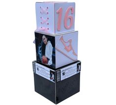 three boxes stacked on top of each other with the numbers 16 and nike shoes in them