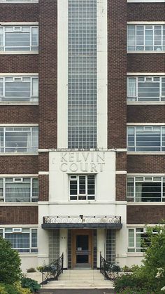 the front entrance to an old brick building