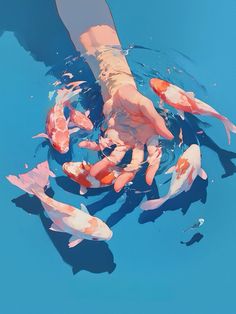 a person's hand reaching for some fish in the water