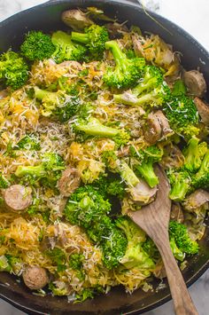 a skillet filled with broccoli and mushrooms